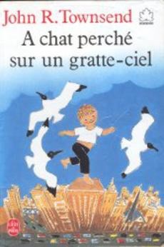 A chat perché sur un gratte-ciel - couverture livre occasion